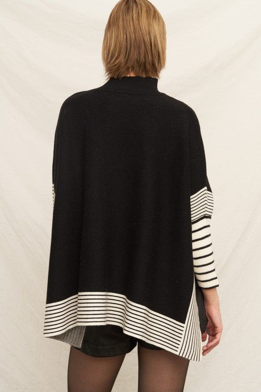 "STRONG FORTRESS" KNIT CAPE