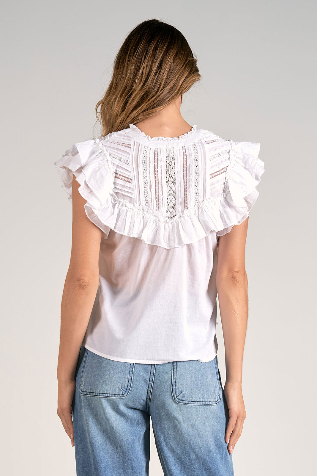 "INFINITELY MORE" BLOUSE