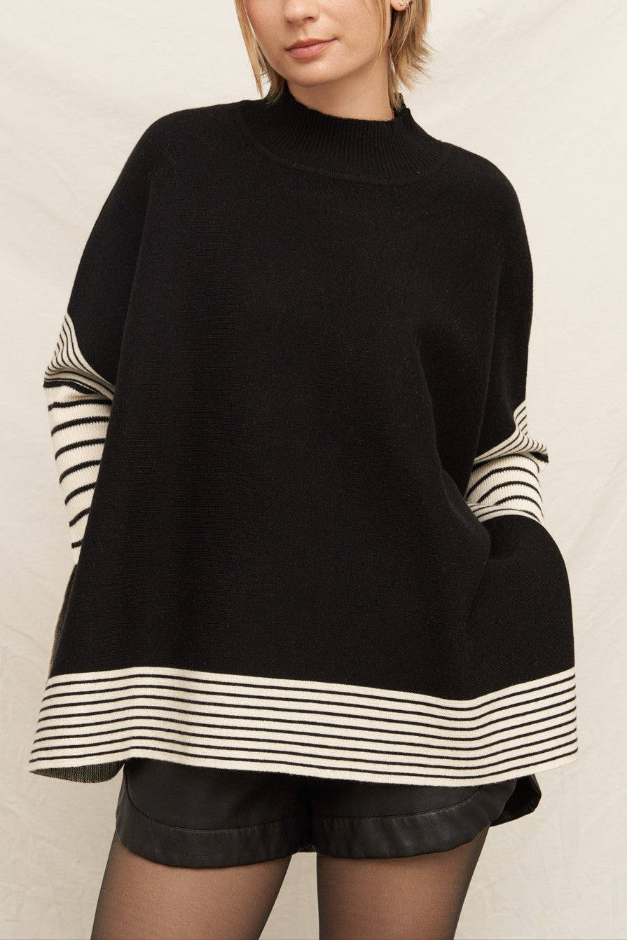 "STRONG FORTRESS" KNIT CAPE