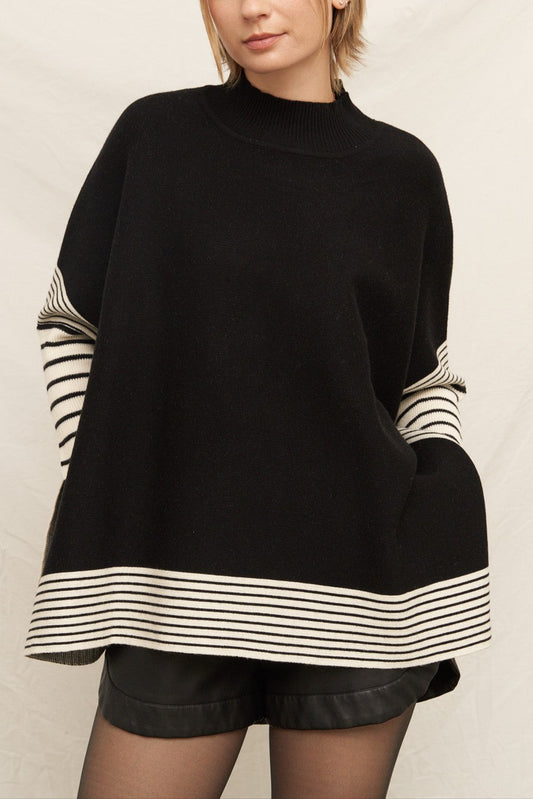 "STRONG FORTRESS" KNIT CAPE