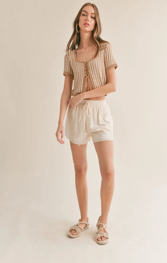 BROWN AND WHITE TIE SWEATER