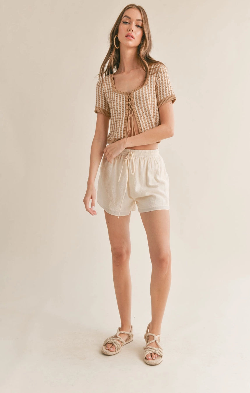 BROWN AND WHITE TIE SWEATER