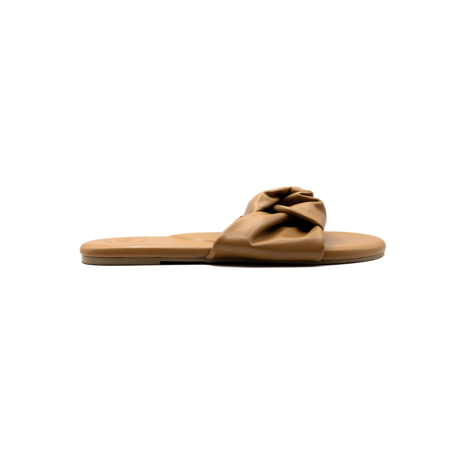 Single sandal with a brown strap and white sole on a white background
