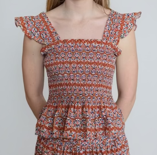 Woman in a patterned top 
