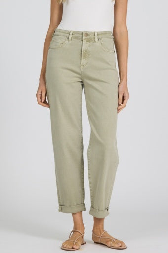 Person wearing light green pants on a white background