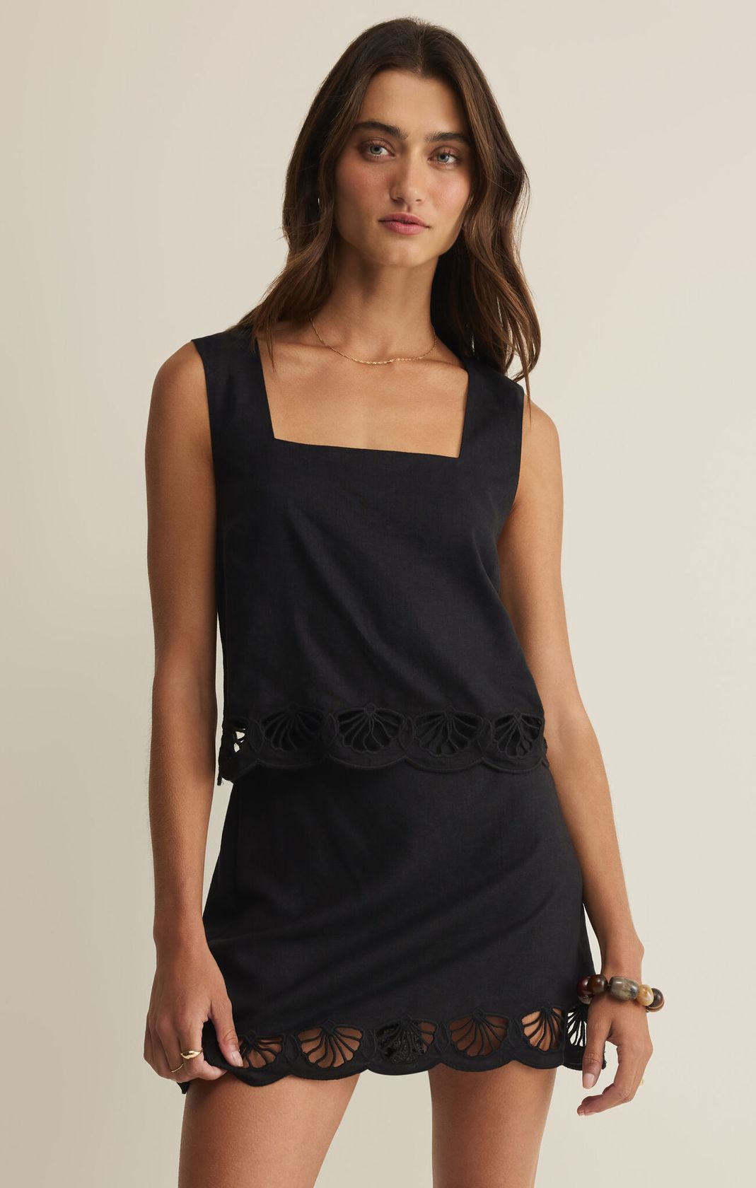 black shell embroidered top