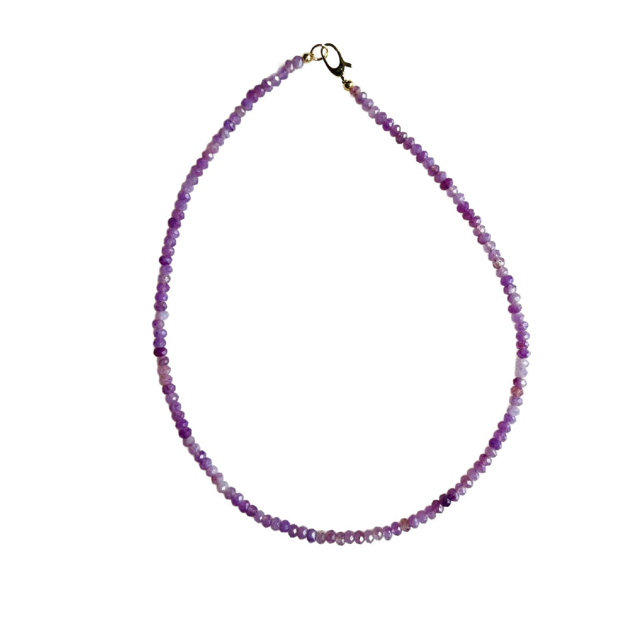Necklace with purple beads on a white background