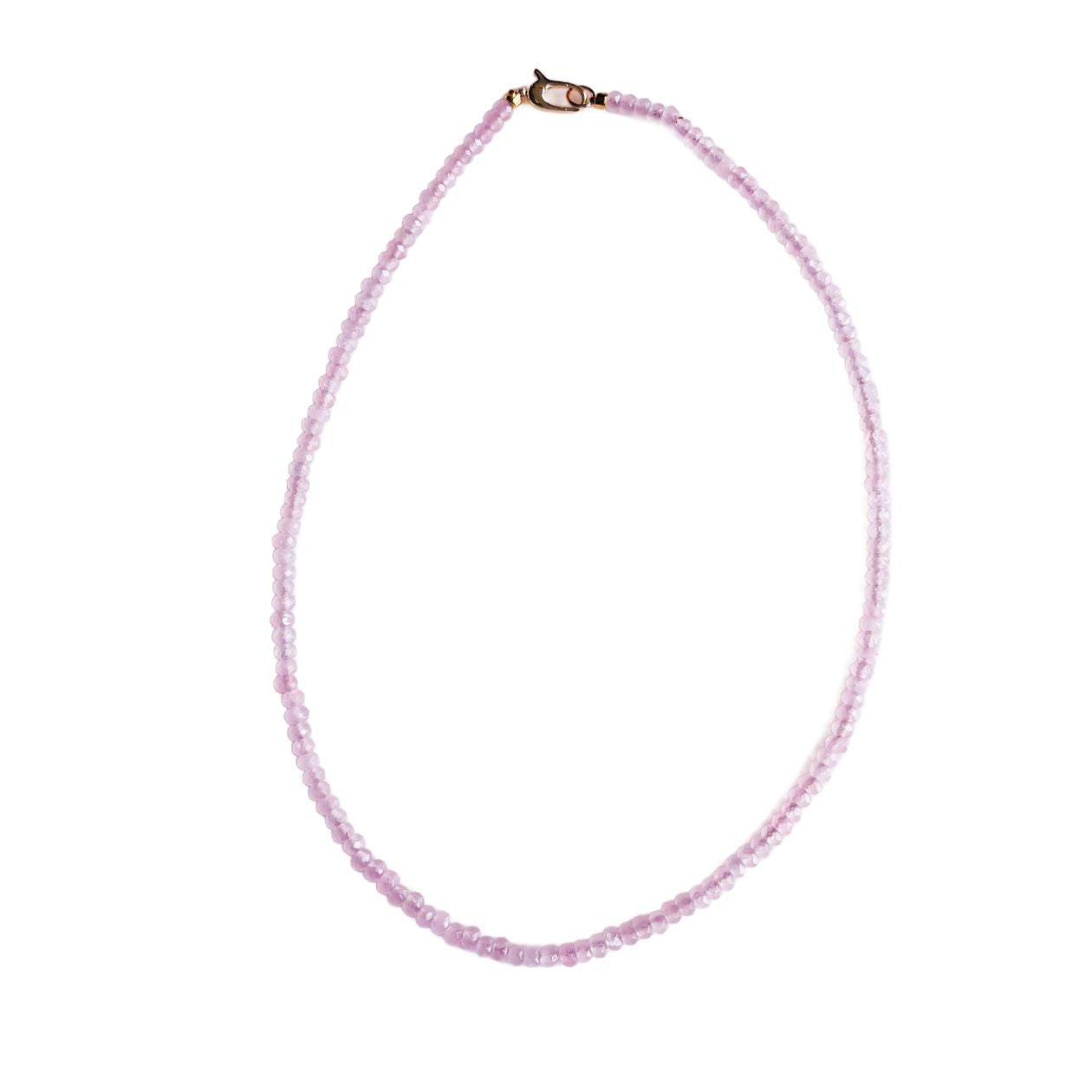 Pink beaded necklace on a white background