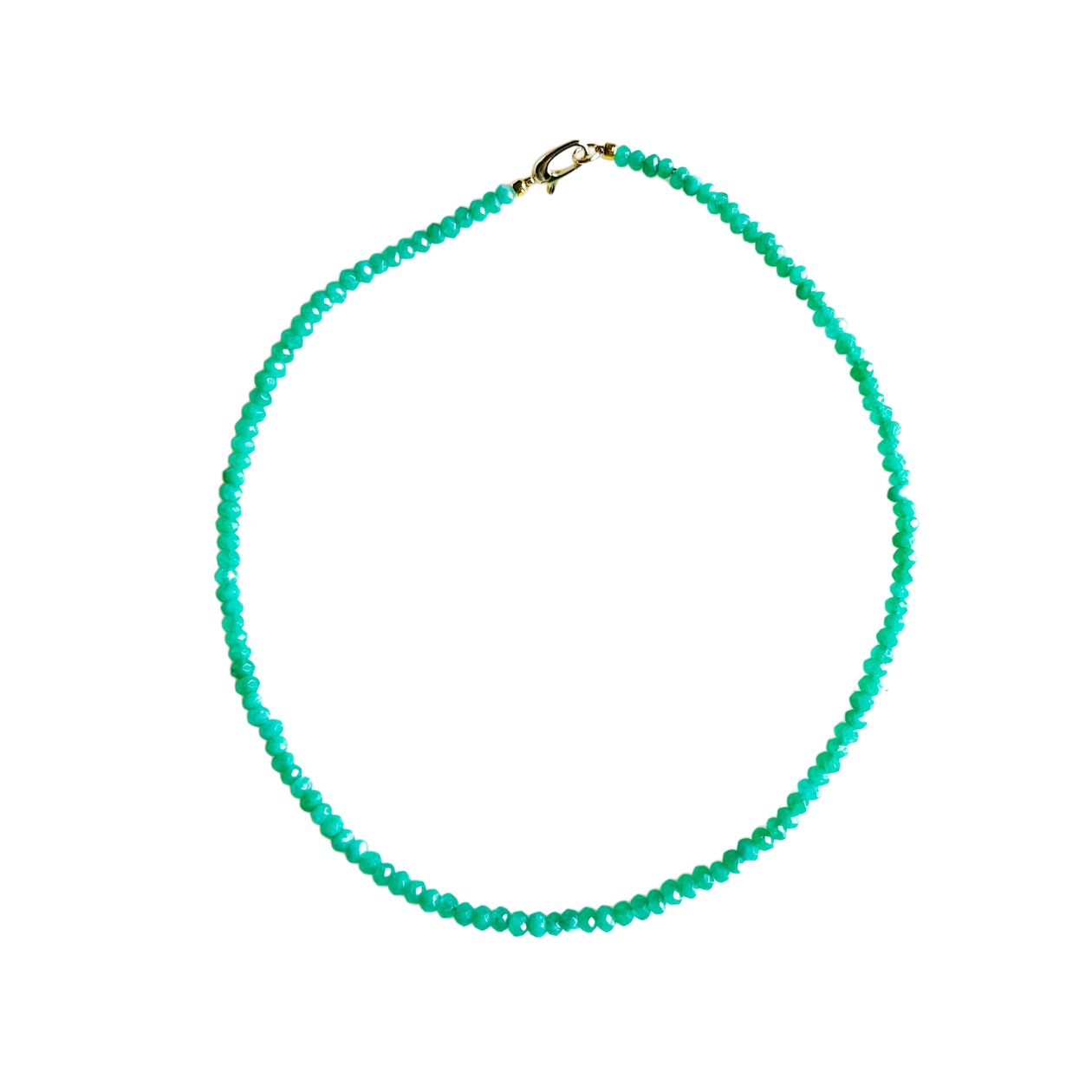 Turquoise beaded necklace on a white background