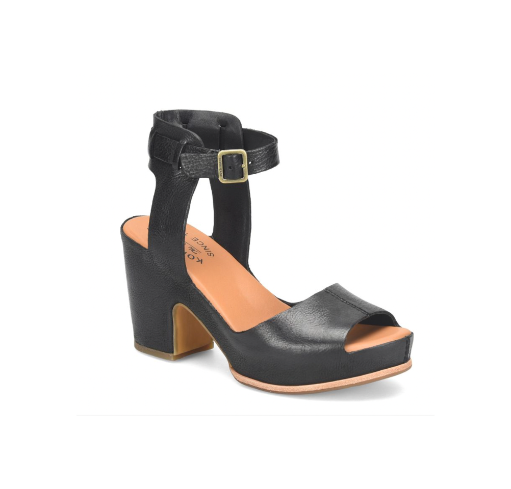 Black open-toe sandal with a block heel on a white background