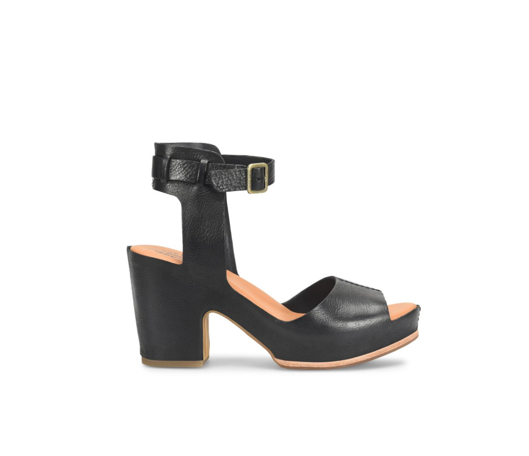 Black sandal with a block heel on a white background