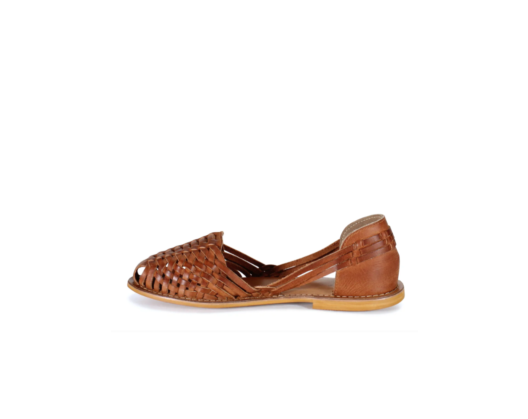 Brown woven sandal on a white background