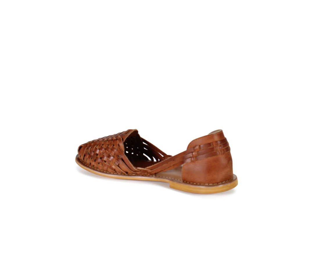 Brown woven sandal on a white background