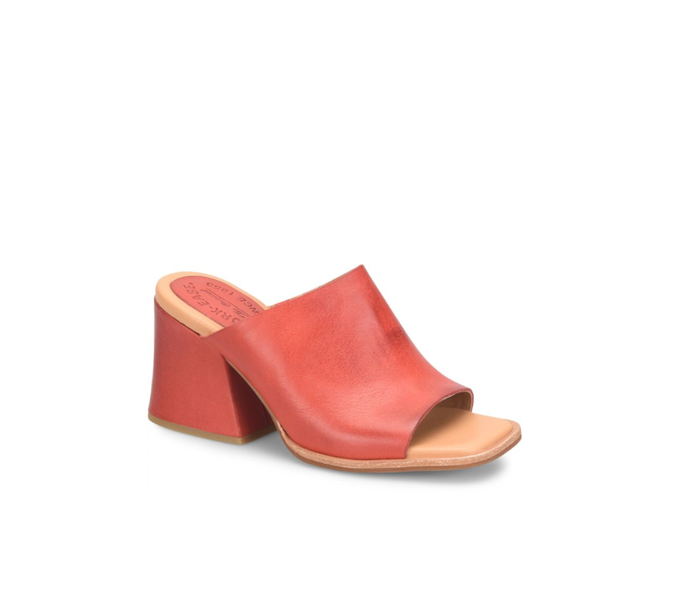 Brown leather sandal with a block heel on a white background