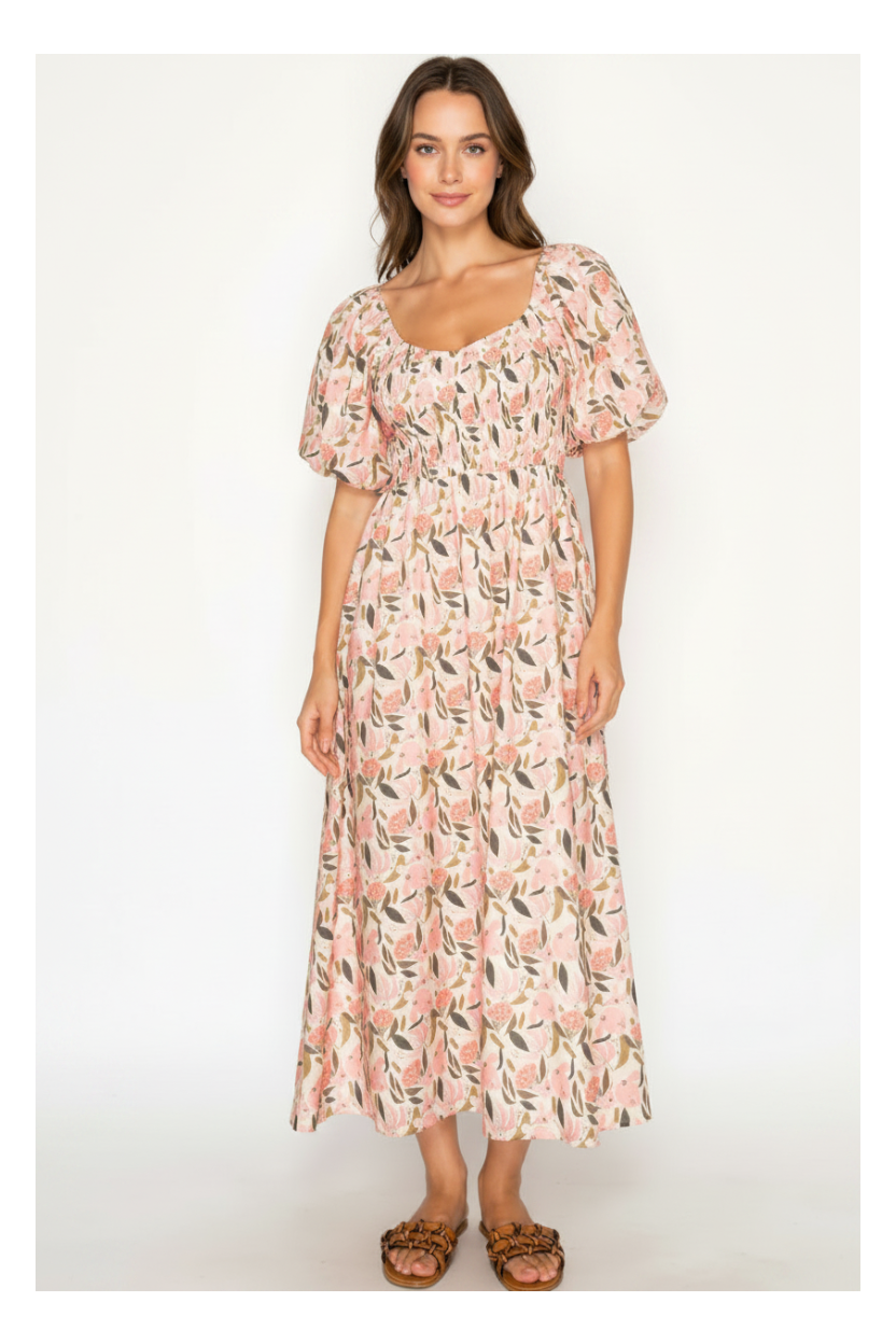 Woman wearing a floral dress on a white background