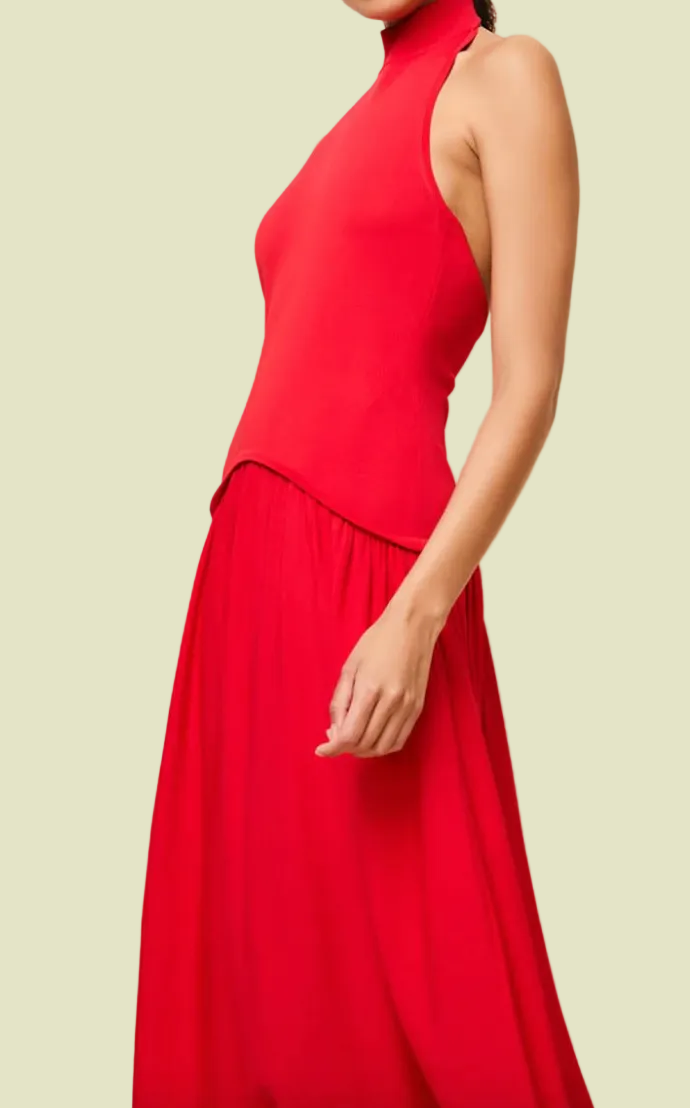 Red sleeveless dress on a beige background