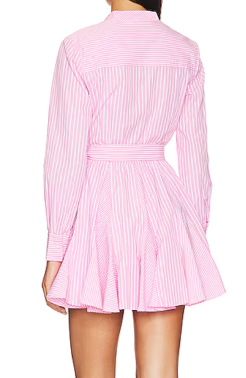 Pink striped dress worn by a person on a white background