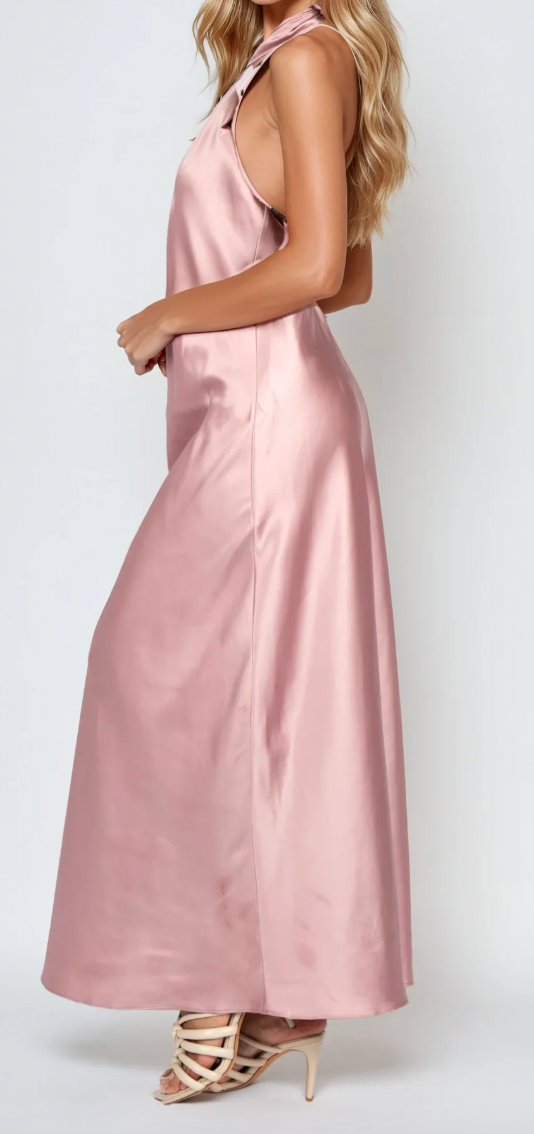 Pink satin dress worn by a person on a white background