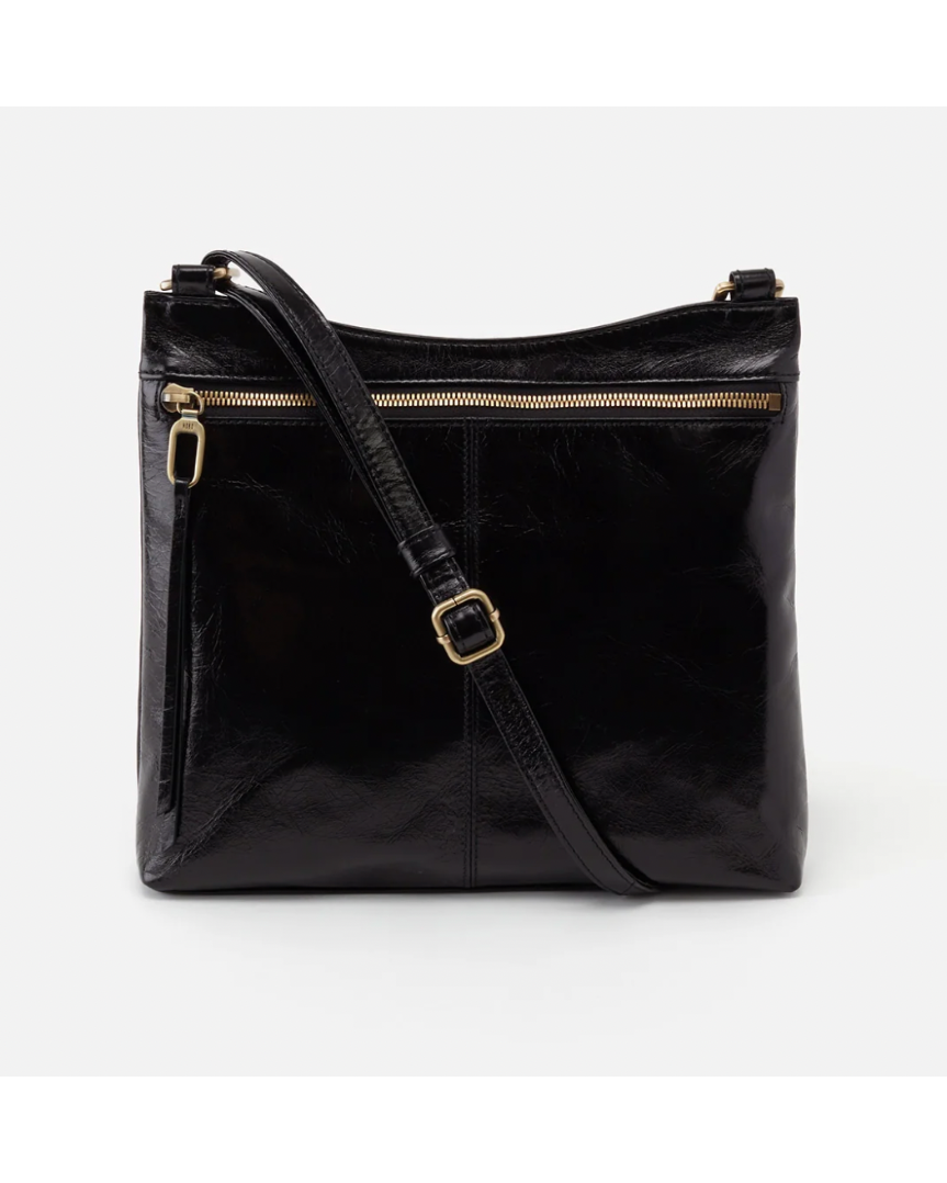 Black leather handbag with gold zipper and buckle on a white background