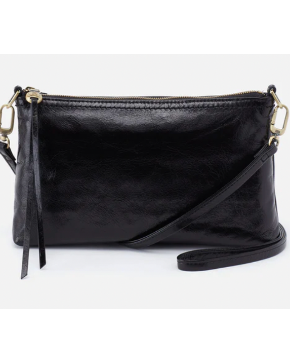Black leather handbag with a strap on a white background