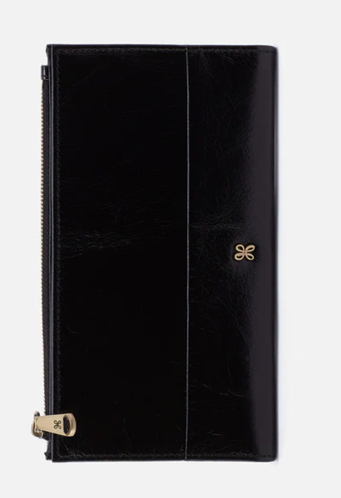 Black leather clutch bag with gold zipper and logo on a white background