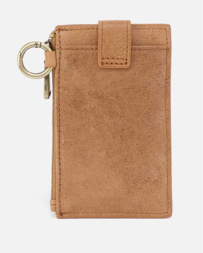 Brown leather wallet with key ring on a white background