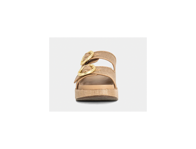Beige sandal with gold buckles on a white background