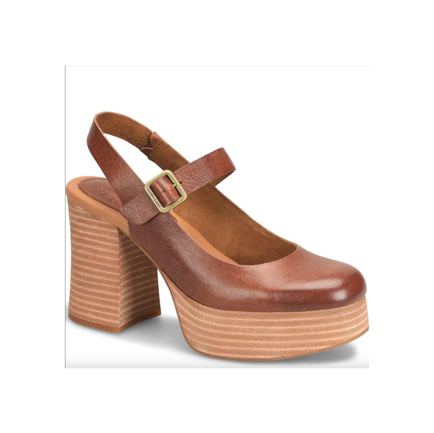 Brown platform shoe with a strap and buckle on a white background