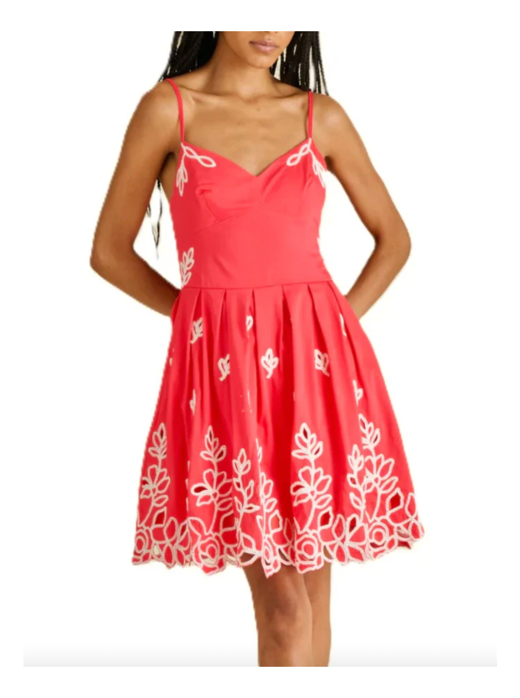 Red dress with white floral patterns on a white background