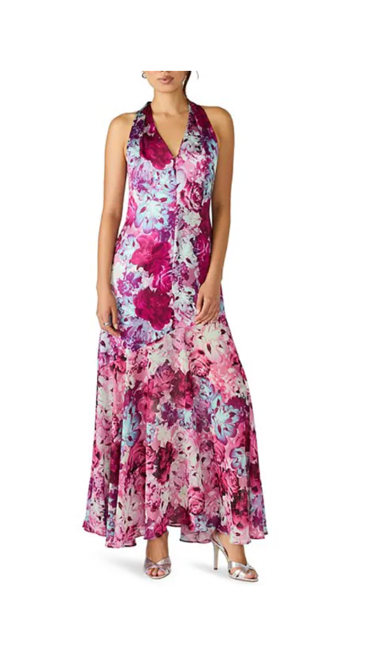 Woman wearing a floral dress on a white background