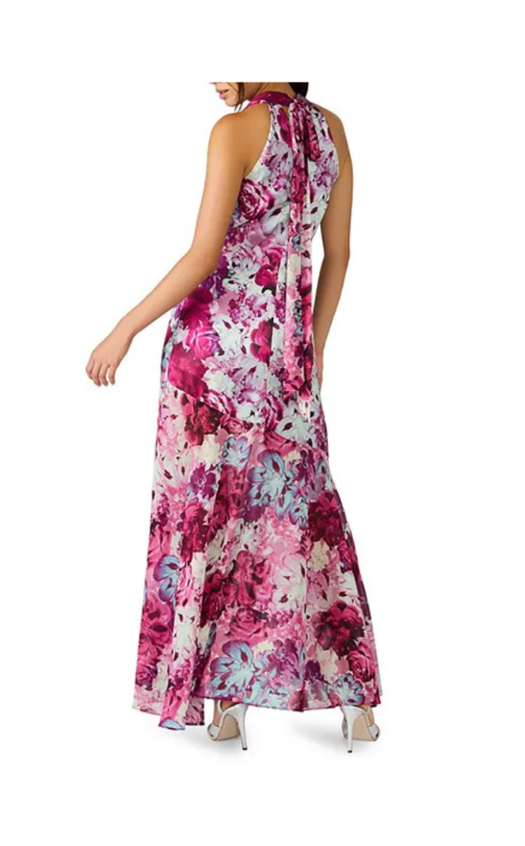 Woman wearing a floral dress on a white background