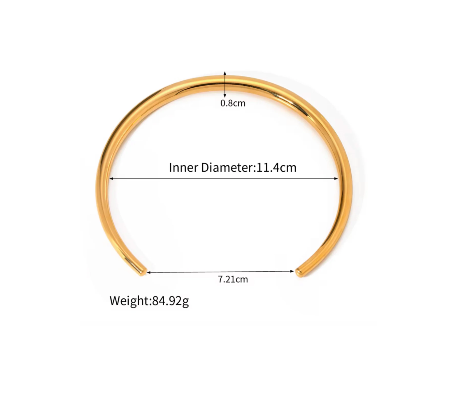 Gold bangle with measurements on a white background