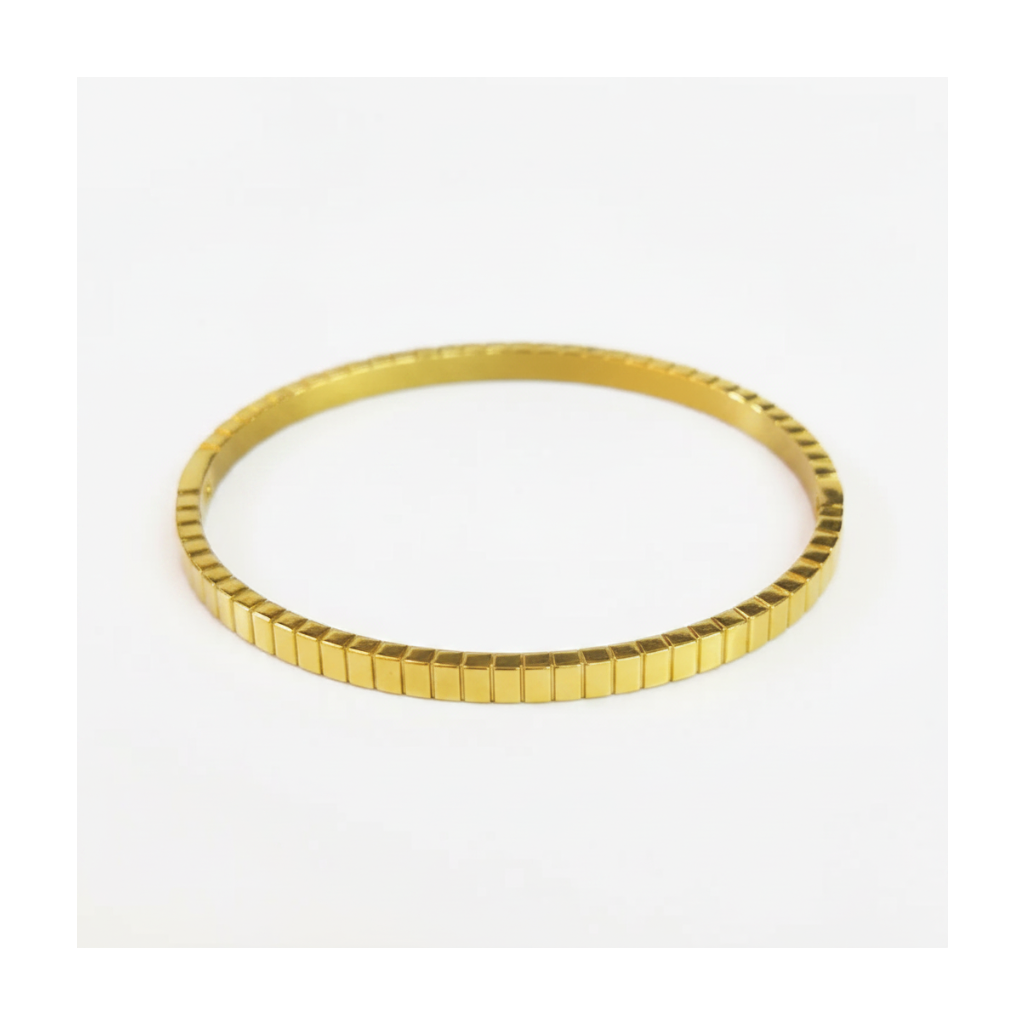 Gold bracelet on a white background