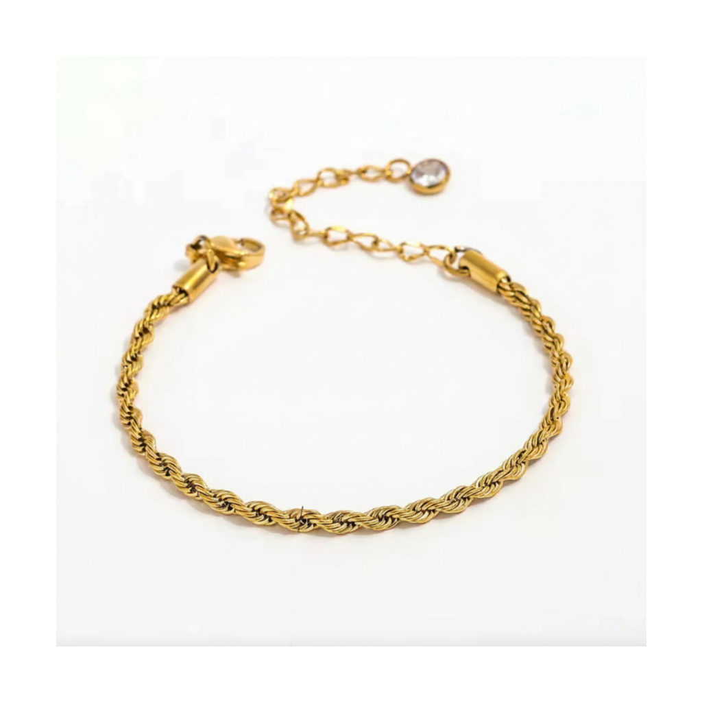 Gold bracelet with rope design on a white background