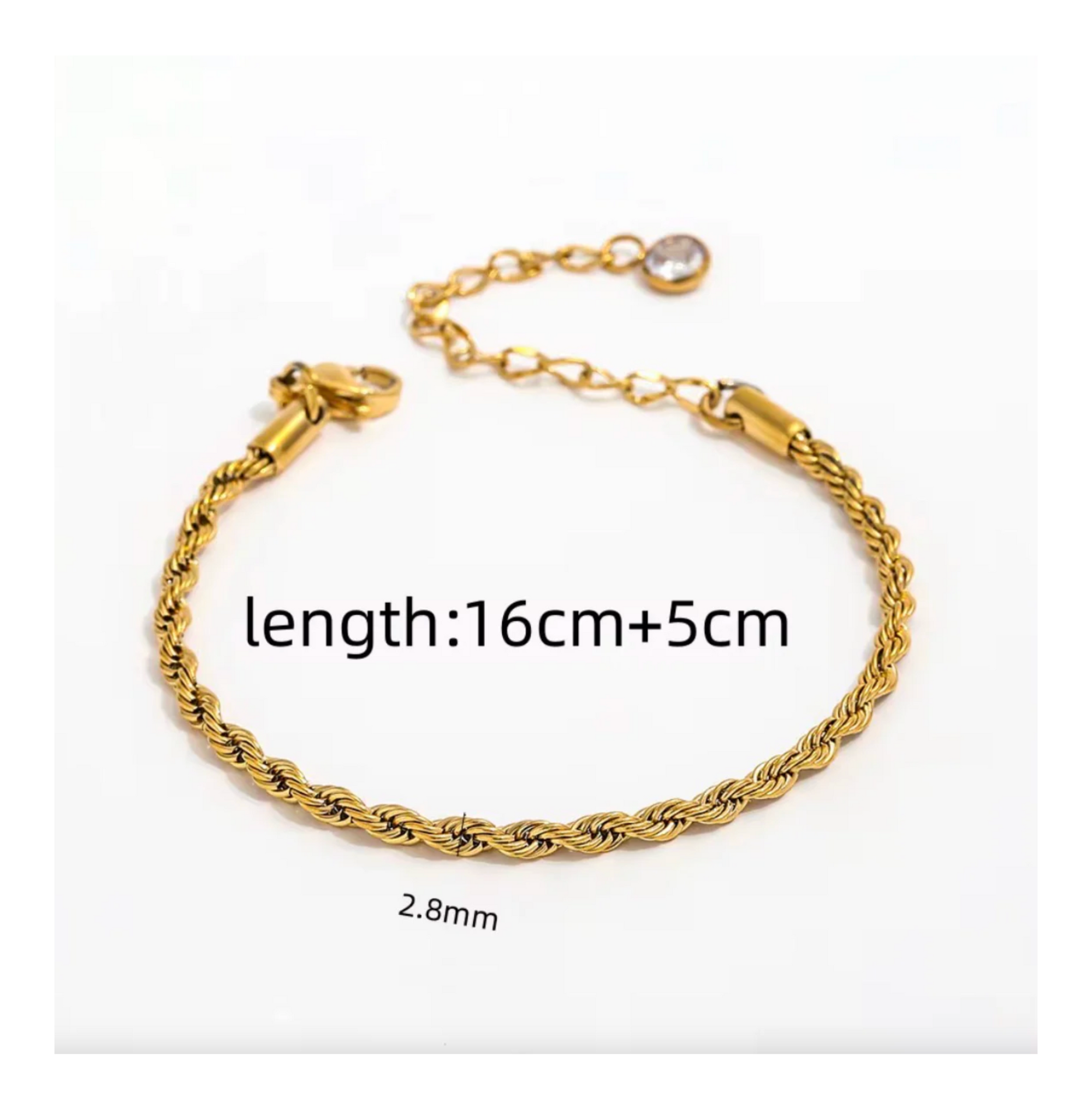 Gold bracelet with rope design on a white background