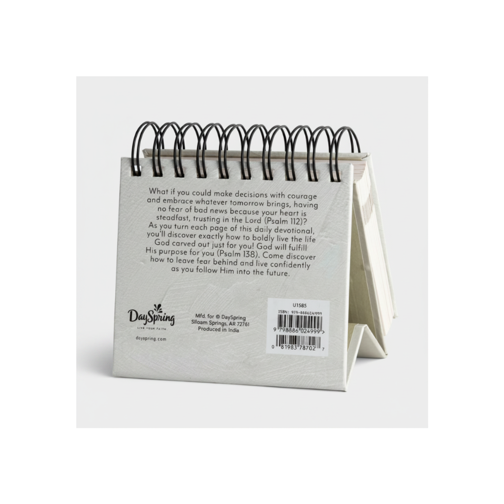 Back of a DaySpring daily devotional calendar with text and branding.