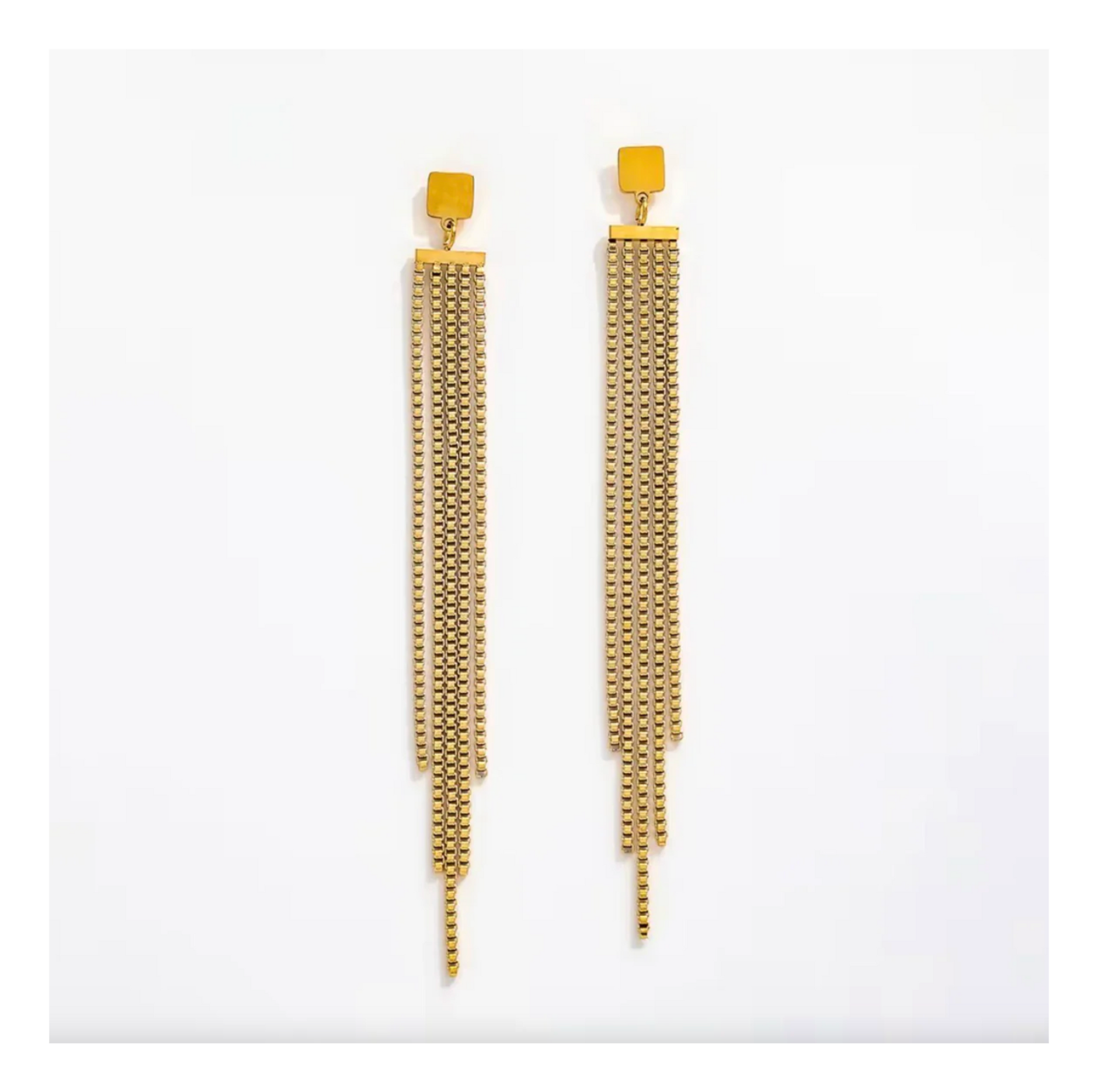 Gold chain earrings on a white background