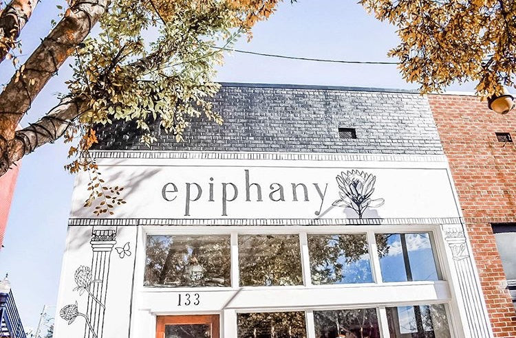 Building facade with 'epiphany' sign and decorative elements
